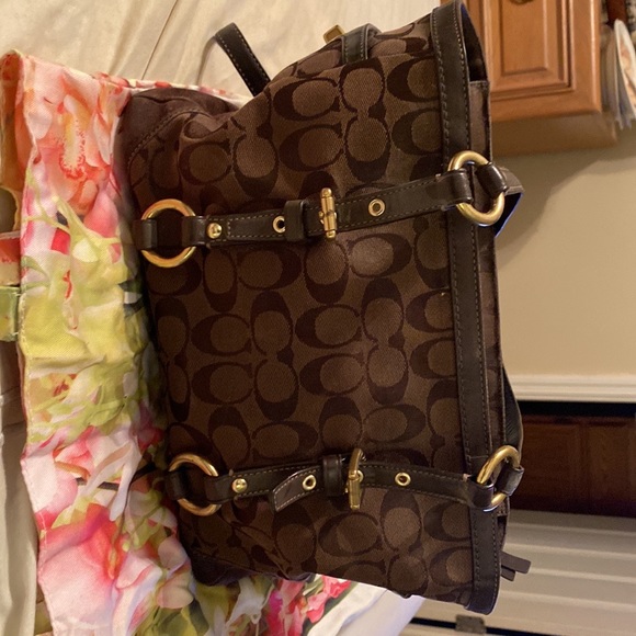 Coach Handbags - Vintage Coach shoulder bag. Dark brown and tan in color.